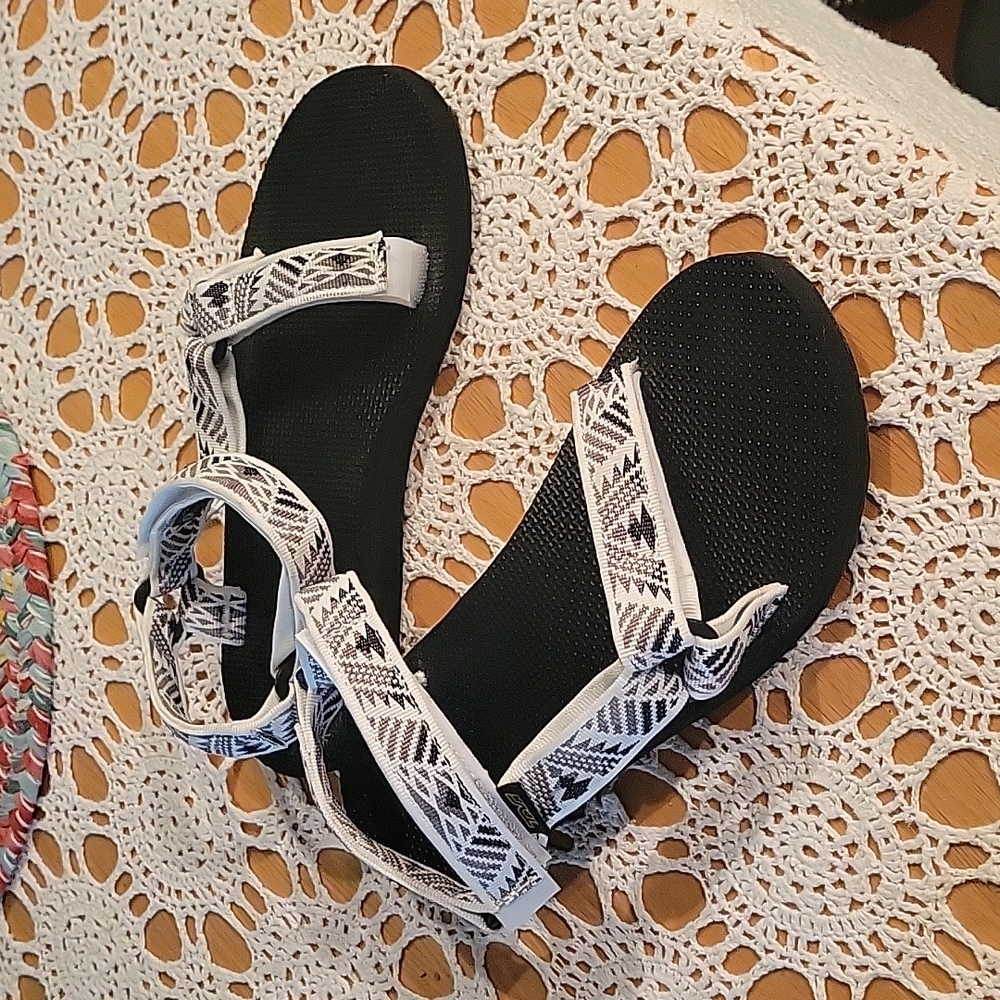 TEVA black and white sandals. Size 9.